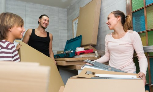 Moving home in Barnet with packed boxes and a removals van on a residential street