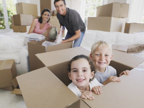 Student removals team loading boxes outside a Barnet property