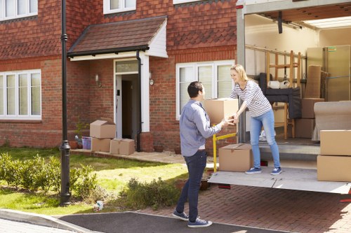 Removal team handling a home move in Barnet with boxes and furniture