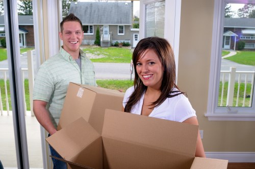 Careful loading of furniture and household items for a house move in Barnet