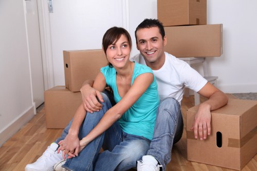 House removals preparation in a Barnet property with packed moving boxes