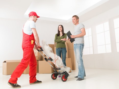 Packed office furniture and equipment prepared for relocation in Barnet