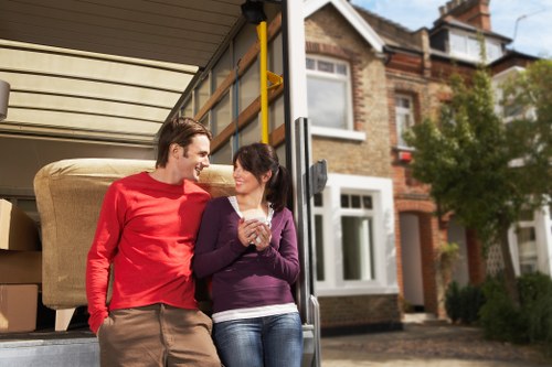 Charity donation of reusable furniture from a removal van